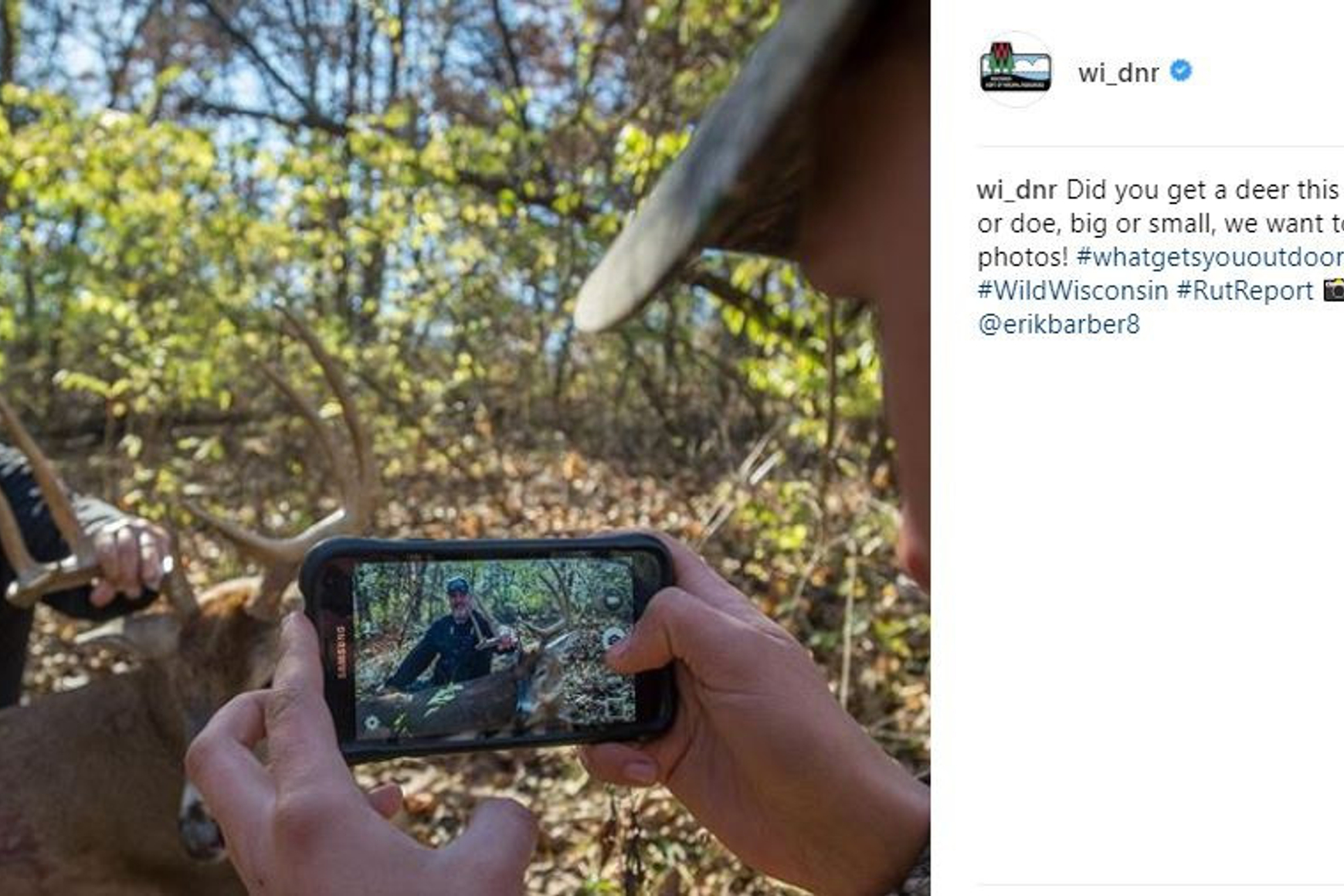 Photo of a smartphone user taking a picture of a hunter