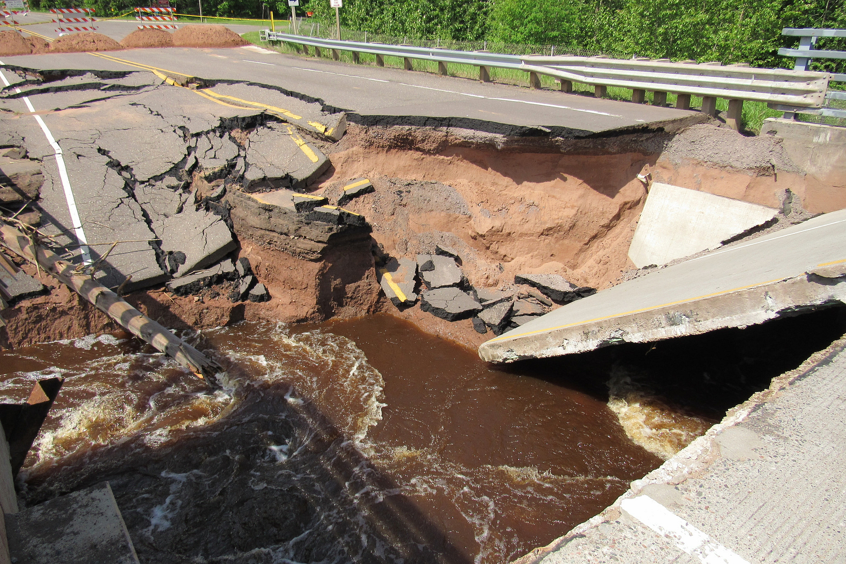 Photo of washed out bridge on Highway 35 near Pattison State Park