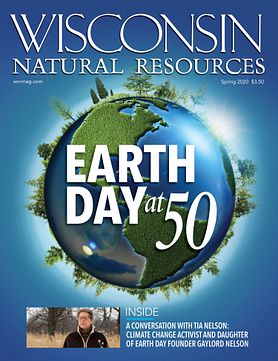 Spring magazine cover with Earth on bright blue background