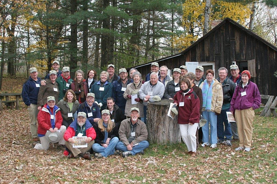 Group of smiling people posing for camera