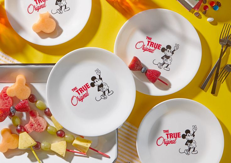 Corelle® 12-pc Dinnerware Set: Mickey Mouse™ - The True Original on table