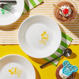 6.75" Appetizer Plate: Mickey Mouse™ - Standing on the table with desserts