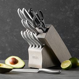 Clybourn Stainless Steel 12-piece Block Set displayed on the counter with an avocado in front of it