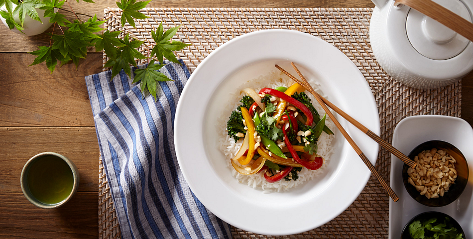 Meal bowl with veggies on top of rice