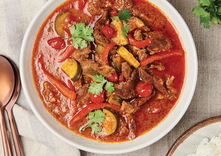 Thai Red Curry Beef served in a white bowl