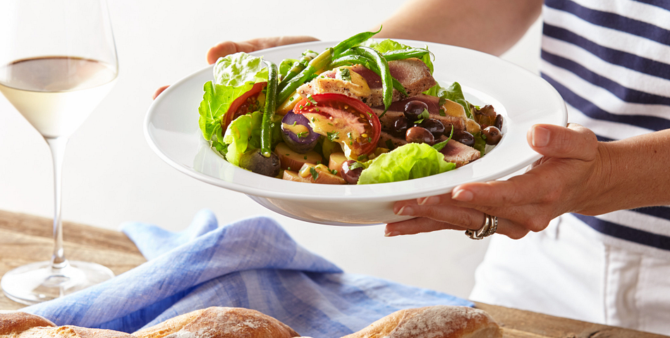 Salad in a dazzling white corelle meal bowl