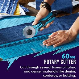 60mm Rotary Cutter with Soft-Touch Handle with text cut through several layers of fabric and denser material like denim