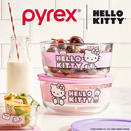 4-cup Round Glass Storage: Hello Kitty®, 2-pack (purple & pink) with food inside and drink on the counter