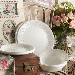Bella Faenza 18-piece Dinnerware Set in photo with pink roses