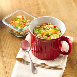 20-ounce Red Meal Mug™ with vegetable mix on the table