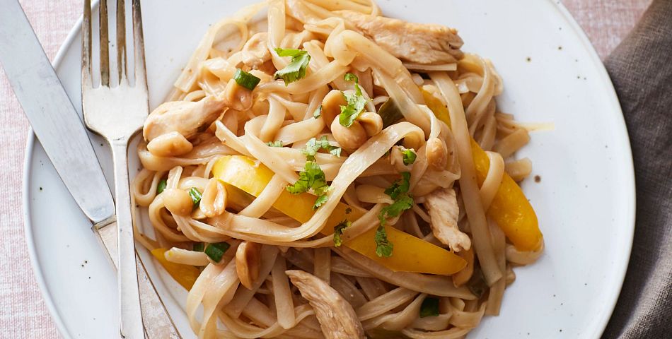 One pot chicken pot thai on plate with silverware