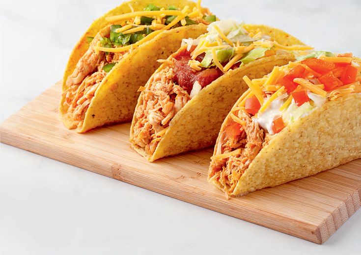 fiesta chicken tacos on table