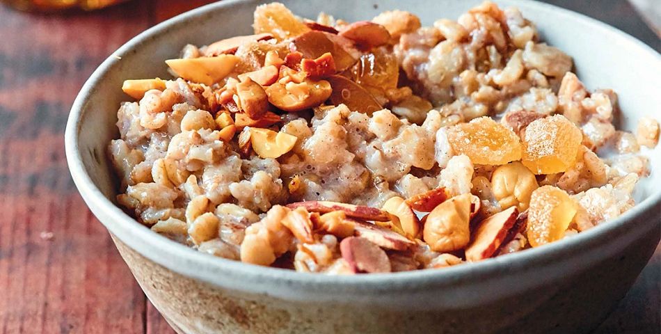ginger almond oatmeal in bowl on table
