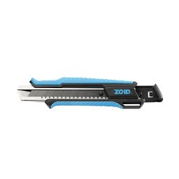 18mm Snap Knife with TraX-Grip™, Black Blade being used to cut carpet