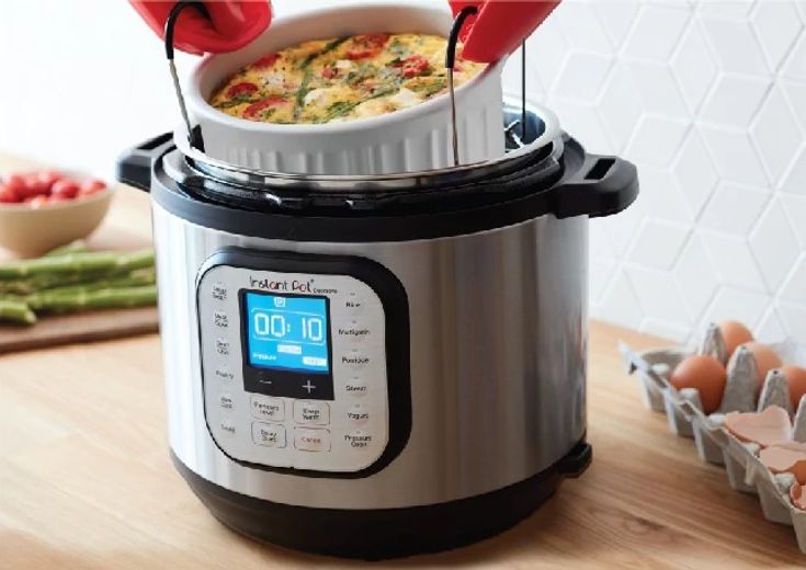 instant pot and corningware on table