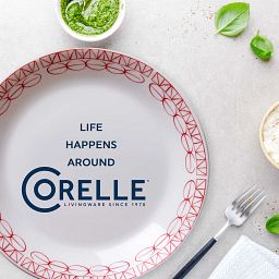  Graphic Stitch 7.5" Salad Plate on table with text Life Happens around corelle