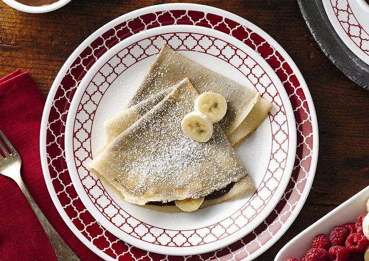 Crepes on Crimson Trellis Dinnerware with Banana Garnish