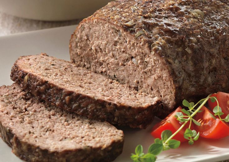 Athenian Meatloaf with Cucumber-Yogurt Sauce on table